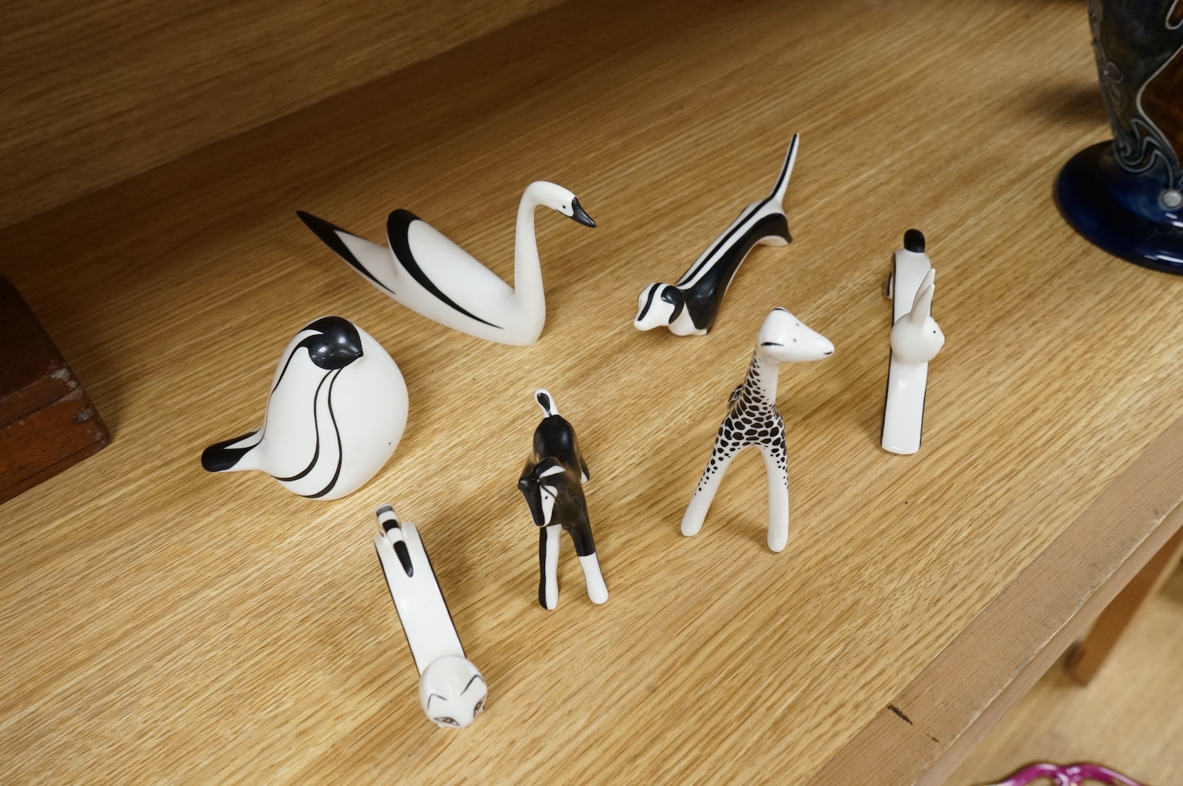 A collection of mid century Cmielow ceramic animals to include cat, rabbit and swan, largest 18cm in length